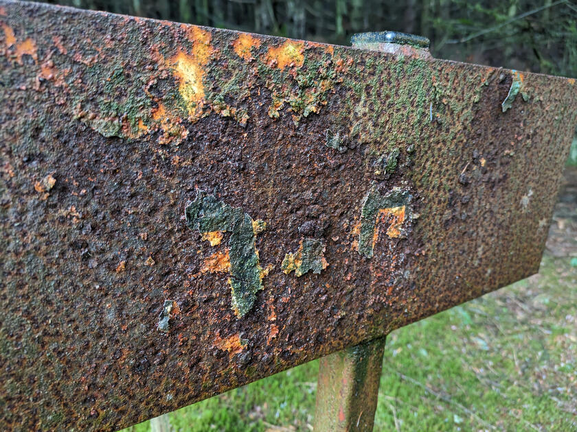 Rusted sign above Bingley
